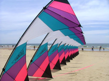 Sam Ritter expertly pilots his huge stack of Revolution kites at the Great Lakes Kite Festival