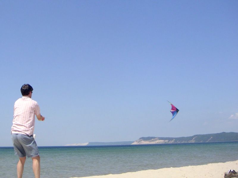 Jacob flying his Prism Nexus kite at Sleeping Bear Dunes