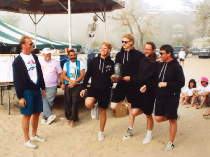 The Roaring Flamingos accept an award at the Great Lakes Stunt Kite Championships