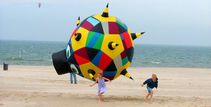 Spikey and Grant Lovett's kids play on the beach